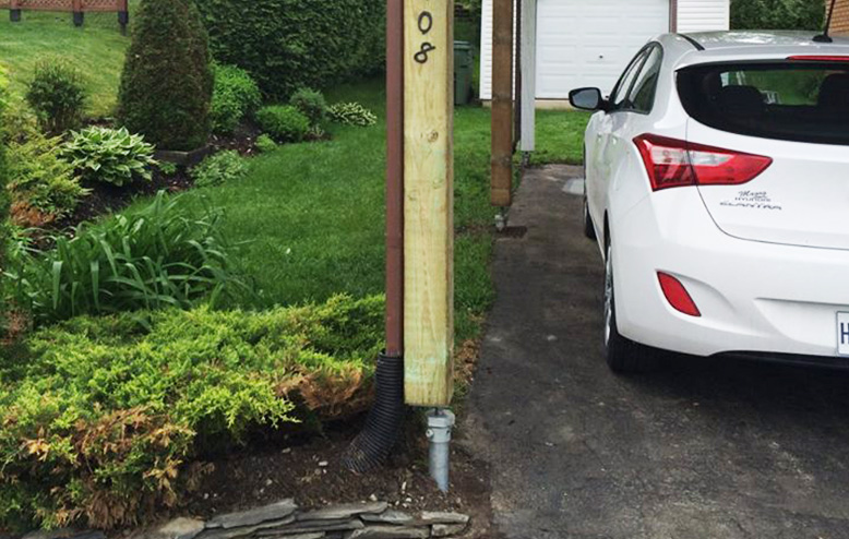 car port on helical piles to prevent damage from high winds