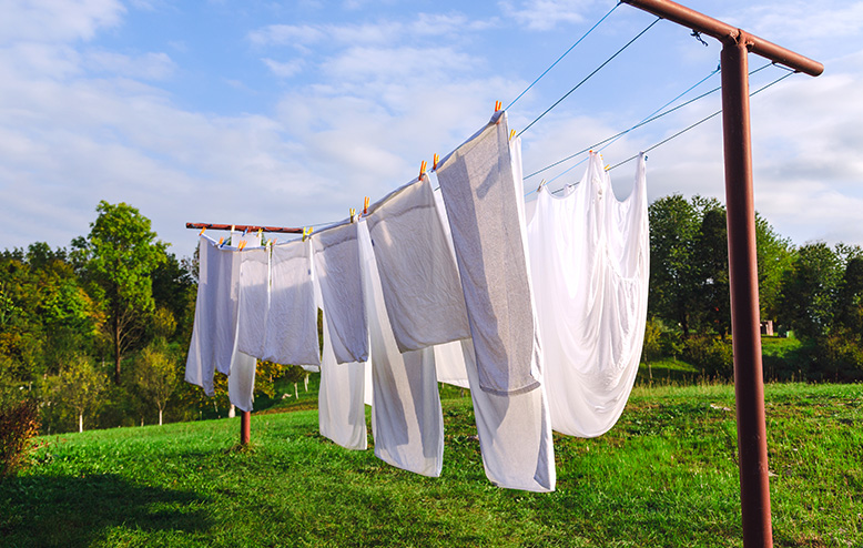 comment installer un poteau de corde a linge de façon durable avec pieu vissé