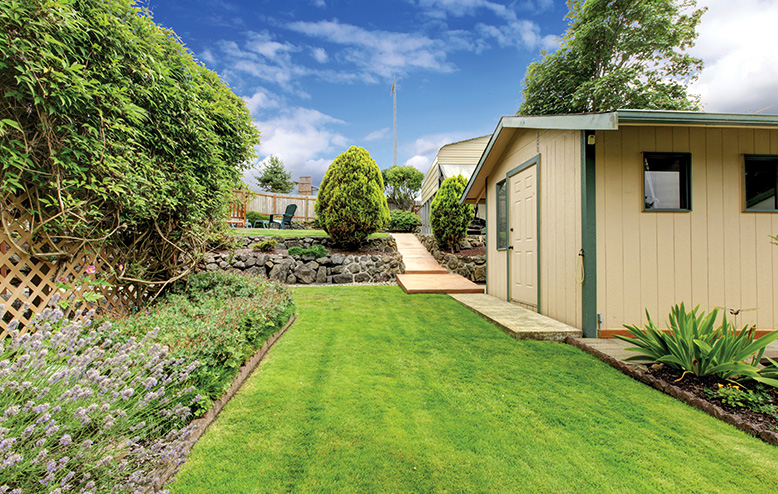 shed on helical piles in a garden