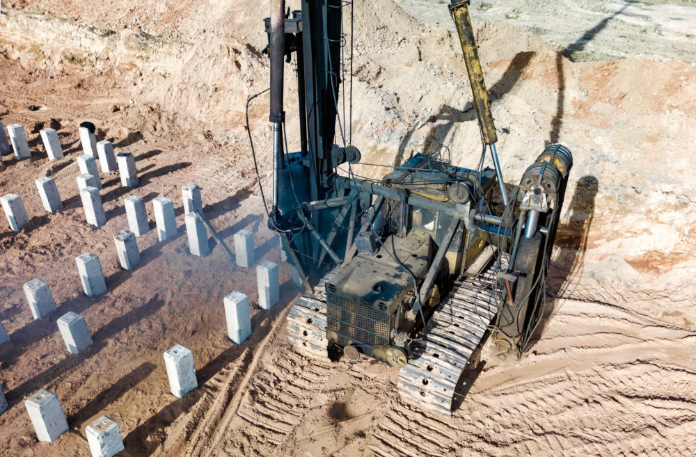 Driven piles with heavy equipment